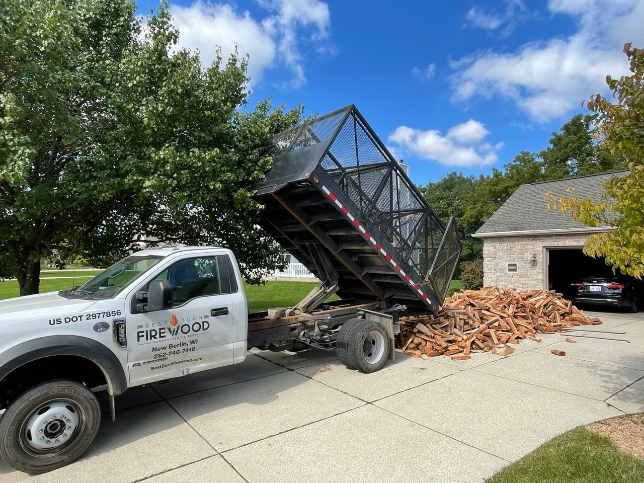 Delivery of kiln dried firewood to a customer's doorstep in Wisconsin