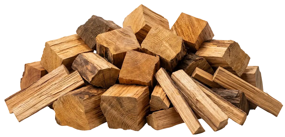 Pile of kiln-dried cooking wood chunks and mini-splits for smokers and grills