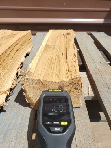 Moisture meter reading low on the exterior face of kiln dried oak firewood